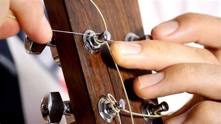 how to change guitar strings